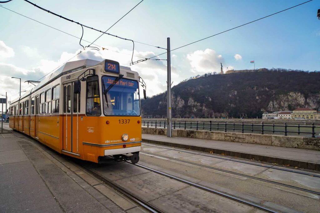 Budapest tram on track along river