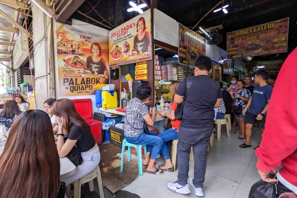 People queuing in front of Jolli Dada's Eatery shop Quiapo Market